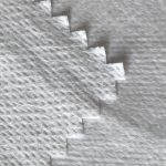 WF1/O9TO5 SS+PTFE Tessuto non tessuto laminato con membrana traspirante lattiginosa in PTFE di tessuto per tute protettive mediche